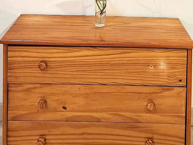 Side table with three drawers.